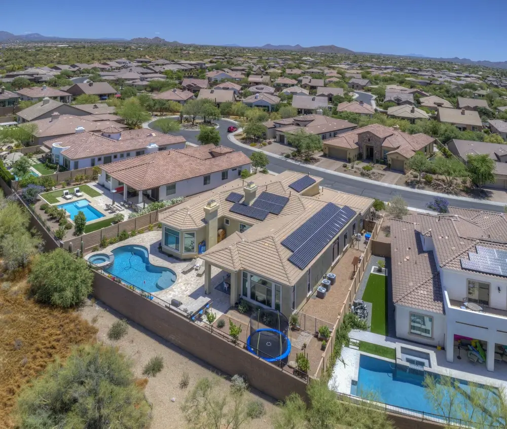 Solar panels on a house with a pool and trampoline in Phoenix, AZ 85032 Solar panels on a house with a pool and trampoline in Phoenix, AZ 85032